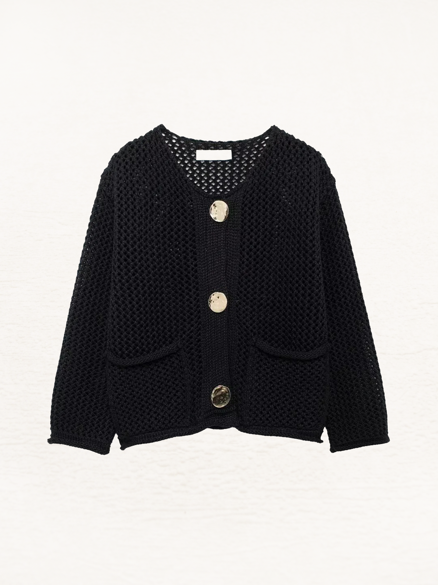 Giulia – Grofgebreid Damesvest met Metallic Knopen"
Rewritten: "Giulia – Chunky Knit Women's Cardigan with Metallic Buttons