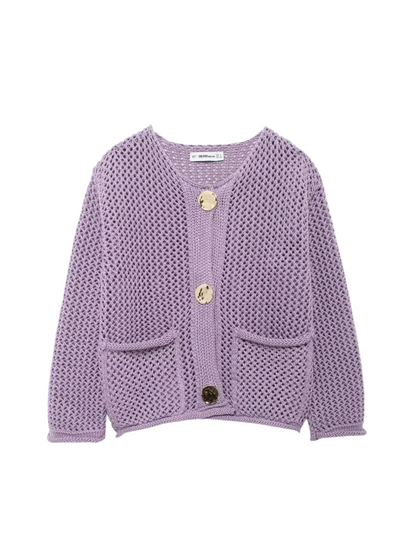 Giulia – Grofgebreid Damesvest met Metallic Knopen" 

Rewritten: "Giulia – Chunky Knit Women's Cardigan with Metallic Buttons