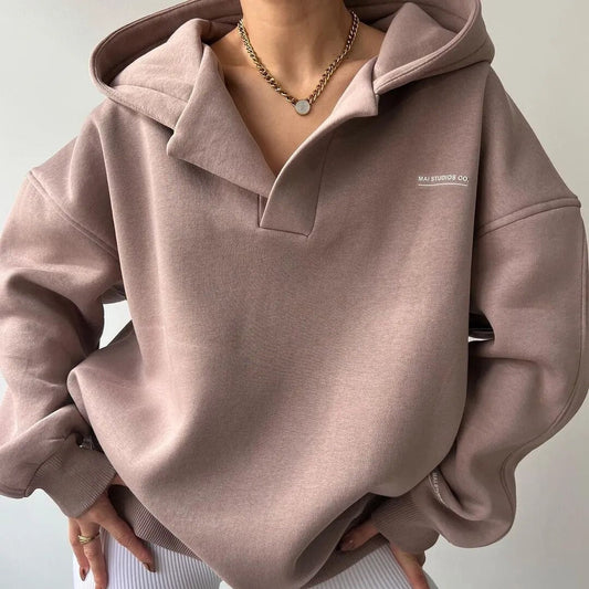 Elena – Oversized Dames Hoodie met Kraag" can be rewritten as: "Elena – Ruime Dames Hoodie met Kraag