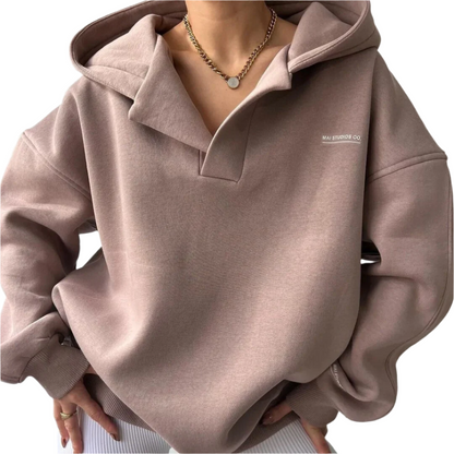 Elena – Oversized Dames Hoodie met Kraag" can be rewritten as: "Elena – Ruime Dames Hoodie met Kraag