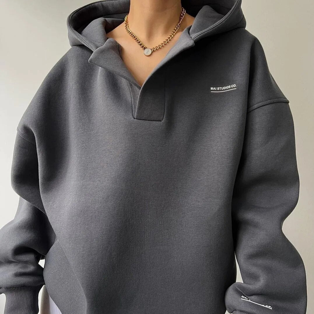 Elena – Oversized Dames Hoodie met Kraag" can be rewritten as: "Elena – Ruime Dames Hoodie met Kraag