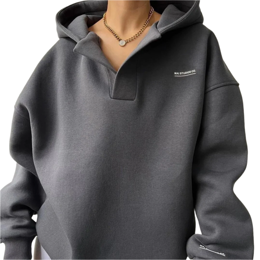 Elena – Oversized Dames Hoodie met Kraag" can be rewritten as: "Elena – Ruime Dames Hoodie met Kraag