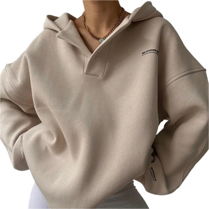 Elena – Oversized Dames Hoodie met Kraag" can be rewritten as: "Elena – Ruime Dames Hoodie met Kraag